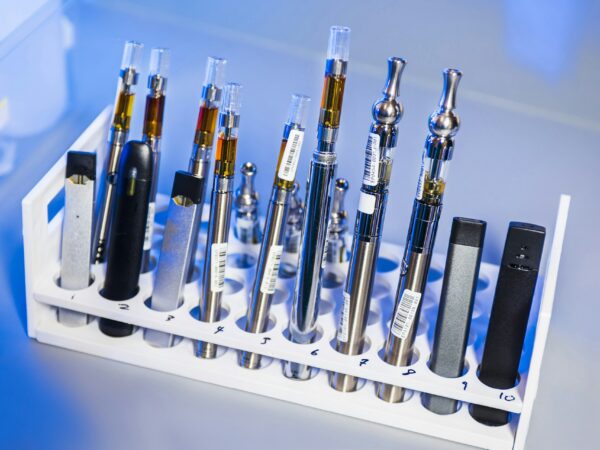 Photo of a rack of vaping devices